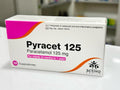Box of Pyracet 125 Paracetamol 125 mg suppositories by Activo Health on a white surface.